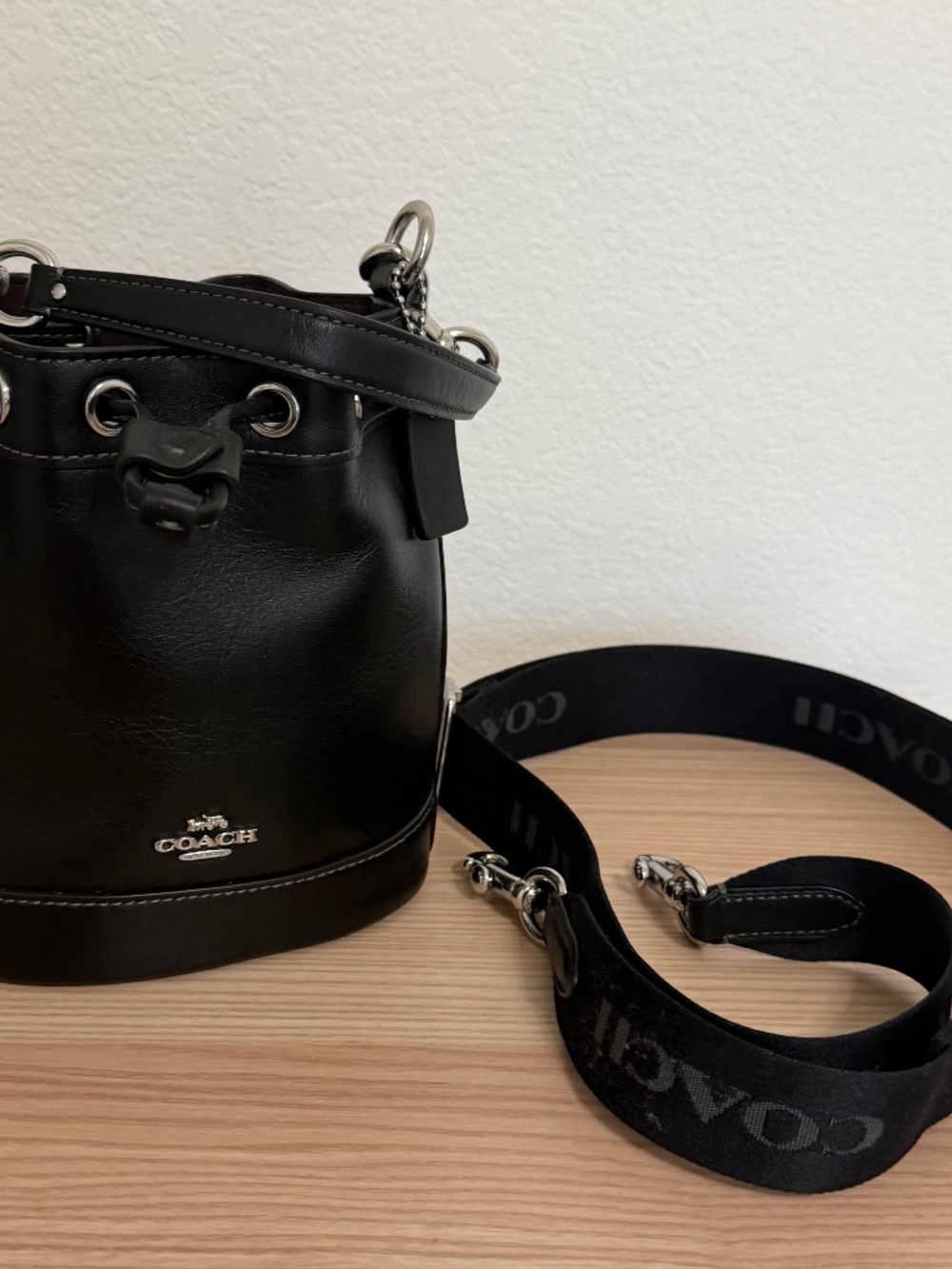 Coach mini bucket bag with cross body strap